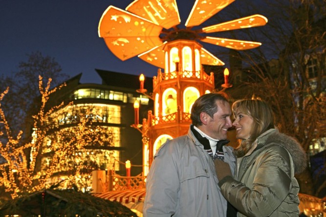 happy woman on christmas market