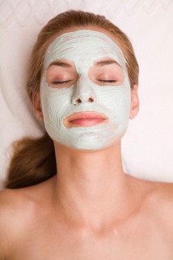 Young pretty woman with face mask.