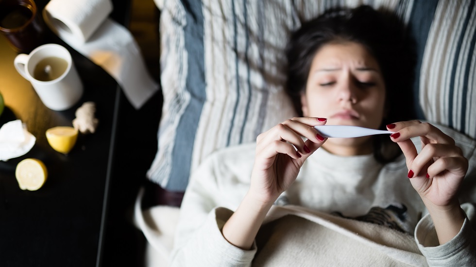 Femeie cu viroza respiratorie
